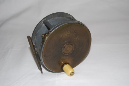 4 HARDY PERFECT SALMON BRASS FACED Wide Spool. RHW. No Line Guard; Long smooth brass foot [ 3 7/8 in. ] with hole in foot fastened with 4 rivets- must be cut down for modern seats; Fat Ivorine Knob; Rod-in-Hand trademark & Straight Line logo on face plate; Late 1896 check with 4-screw block; Circa 1
